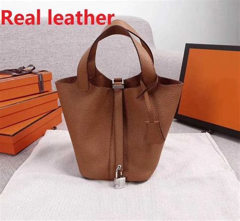 designer bucket bag with lock and key